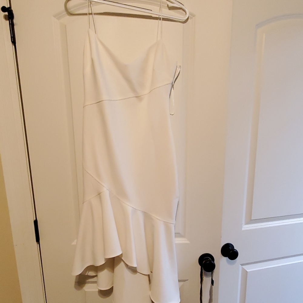 Likely white midi dress